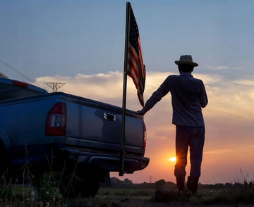 Truck with trailer hitch flag pole
