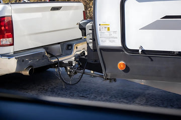 trailer hitch towing a vehicle