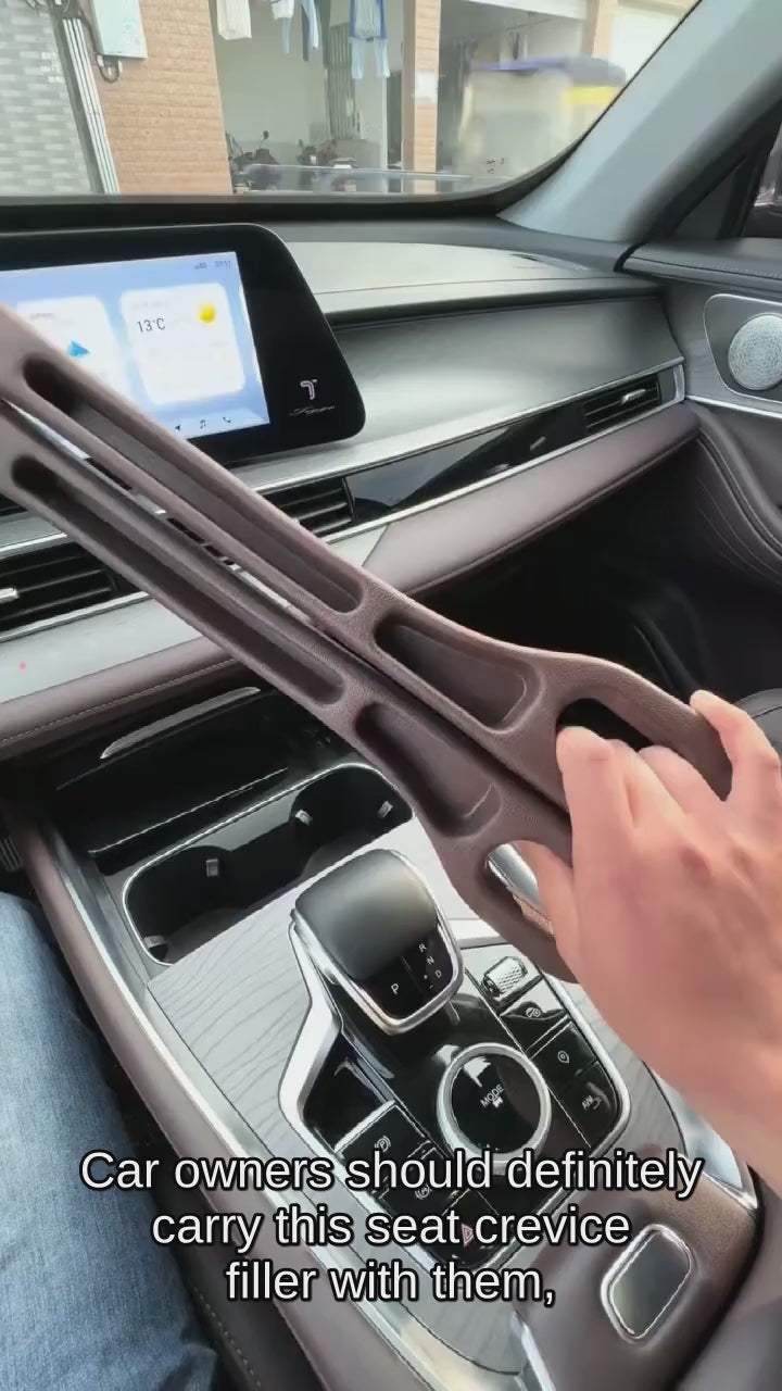 Video showing universal car seat gap filler installation and use